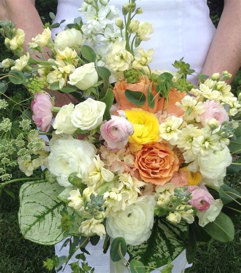 Yellow Coral And Pink Wildflower Bridal Bouquet With Stock Roses