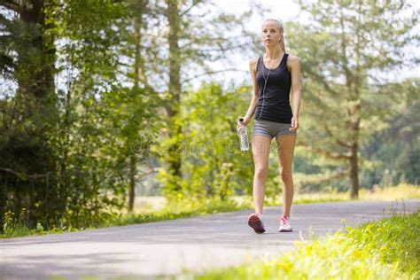 Woman Walking Outdoor In The Forest As Workout Stock Photo Image Of