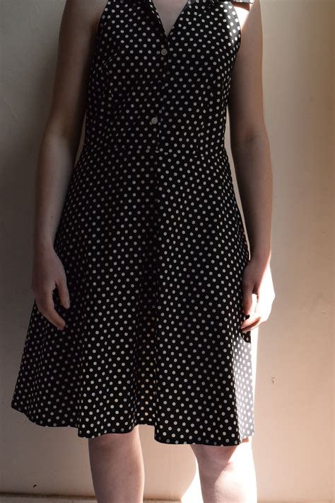 black and white polka dot sleeveless racerback dress
