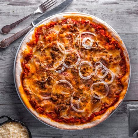 Recette Pizza viande hachée et fromage facile sur Chefclub daily