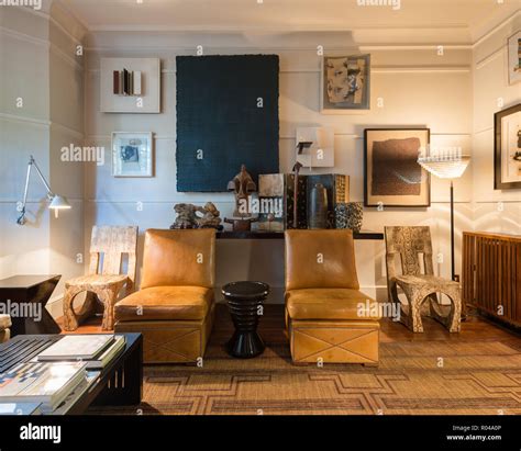 Eclectic Living Room With Leather Chairs Stock Photo Alamy