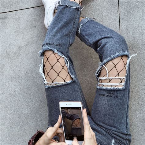 Fish For Compliments With These Fishnet Tights Under Our Ripped Jeans