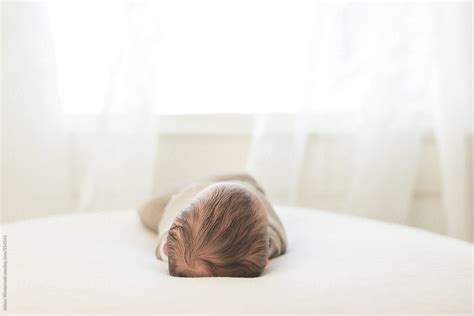 The Head Of A Swaddled Baby By Stocksy Contributor Alison Winterroth