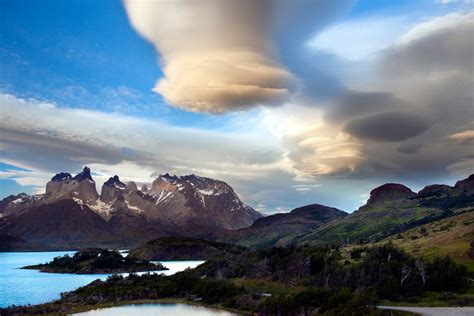 Aerial Photo Of Mountains With Body Of Water During Daytime Picasso