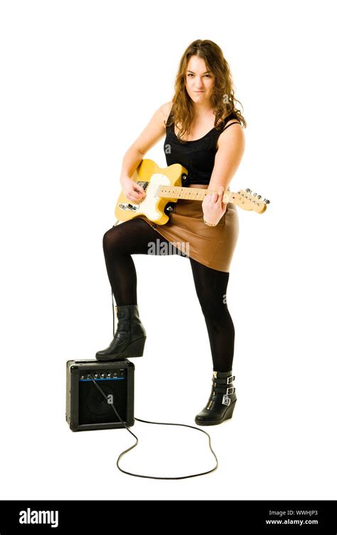 Young Woman Playing Electric Guitar Isolated On White Background Stock