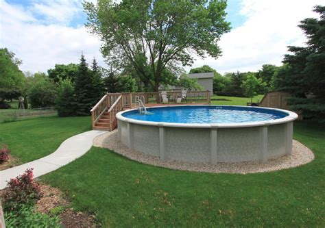 Above Ground Pool With Partial Deck And Sidewalk Backyard Pool
