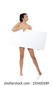 Sexy Naked Brunette Holding Empty Board Stock Photo