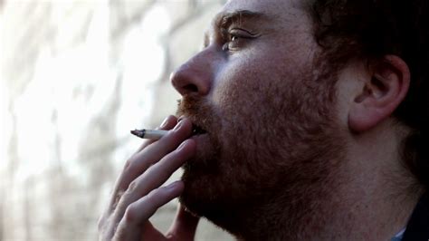 Male Smoking Cigarette Stock Footage SBV 301100949 Storyblocks