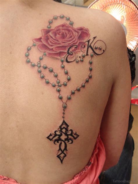 The rose and cross tattoo can also be a patriotic inking for english people. 46 Beauteous Rosary Tattoos On Back