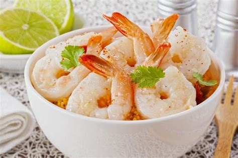 Just before serving, fluff up the couscous and toss through the prawns. Garlic Prawns With Couscous Stock Photo - Image of garlic ...
