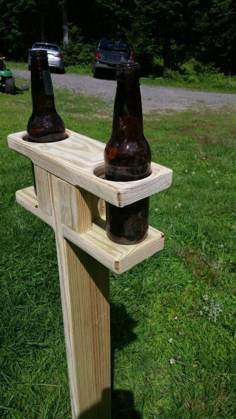 Diy horseshoe pit with cup holders. Outdoor beverage spike. Perfect to hold your favorite ...