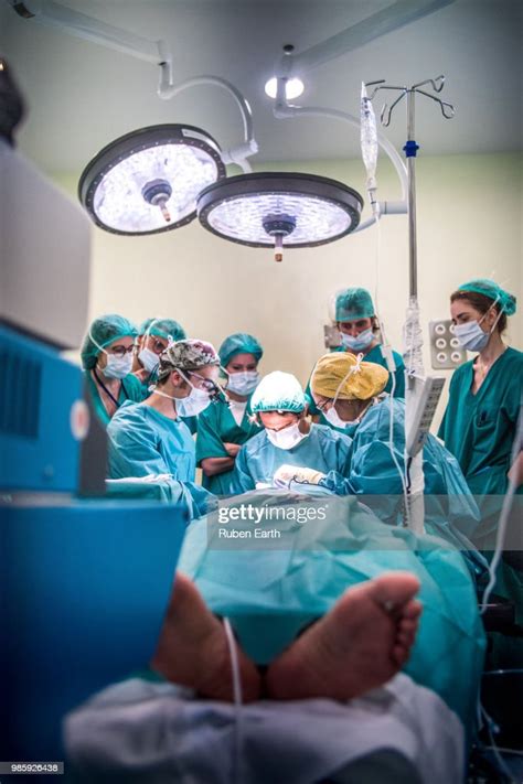 The Surgeon Team Working In A Surgery In The Operating Room High Res