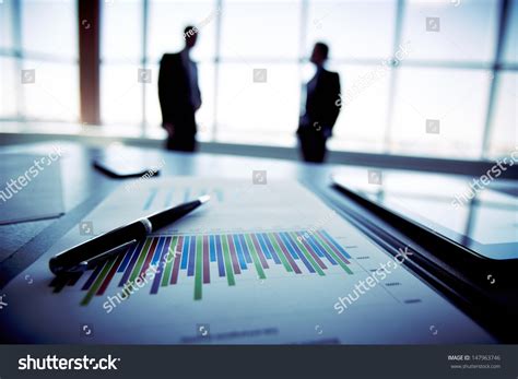 Closeup Financial Report Silhouettes Business People Stock Photo