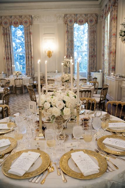 A Table Setting For The State Dinner In Honor Of Her Majesty Queen