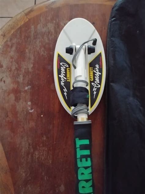Its world renowned 15khz groundhog circuitry has the power to penetrate through heavily while detection depths vary with conditions, this detector generally finds metal objects at depths of 2 to 6 feet. metal detector Garrett scorpion gold stinger for Sale in ...