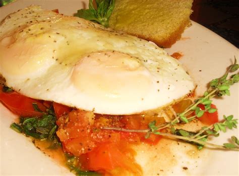 Fried Eggs With Onion And Tomato