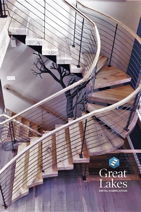 This Monostringer Steel Staircase Incorporates Beautiful Butternut Wood