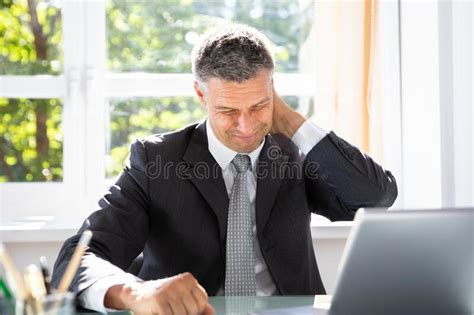 Businessman Suffering From Neck Pain Stock Photo Image Of Laptop