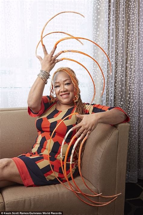Lady Who Spent 23 Years Growing Her Nails Crowned The Woman With Longest Fingernails Photos