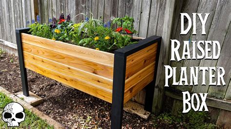 Cedar boards you cut at each end of the 8 ft. Raised Planting Boxes - Aumondeduvin.com