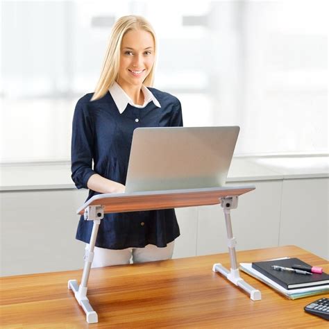 And that is especially true for your boss. This Laptop Stand Is A Game-Changer For Everyone Who Hates ...