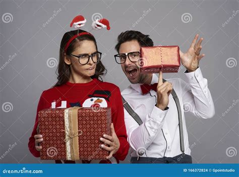 Funny Couple With Many Christmas Gifts Stock Photo Image Of December Geek