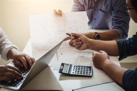 Select the property type, quality of finish, estimated year of construction, closest major city and construction area, then click calculate to find out the minimum and maximum. Close Up Hand Of Civil Engineer Or Architect Business ...