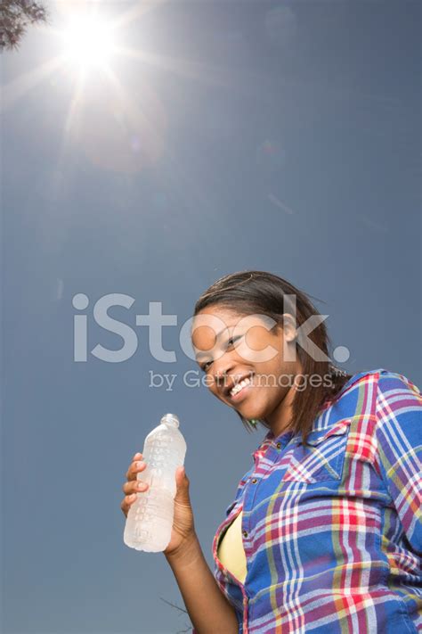 Female Drinking Cold Water On A Hot Summer Day Stock Photo Royalty