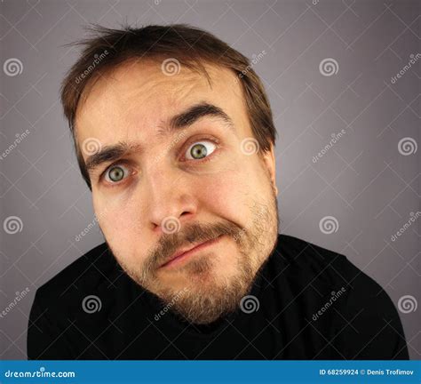 Portrait Of Confused Man Gray Background Stock Photo Image Of