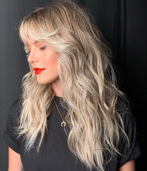 50 prettiest long layered haircuts with bangs for 2023 hair adviser long layered haircuts