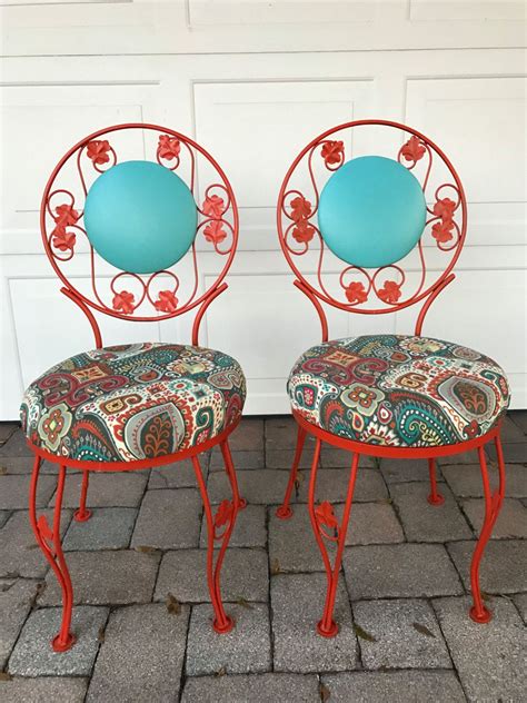 This wrought iron chair is made of a heavy and solid iron, it is a beautiful piece of furniture. Vintage Wrought Iron and Turquoise Vinyl Patio Chairs by ...