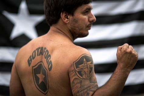 Soccer Fans Tattoo Team Jerseys To Their Naked Torsos