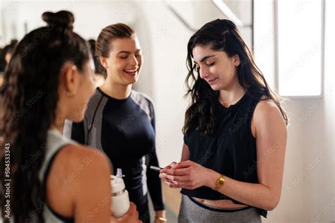 Athletic Women Talking To Each Other In Gym Stock Photo Adobe Stock