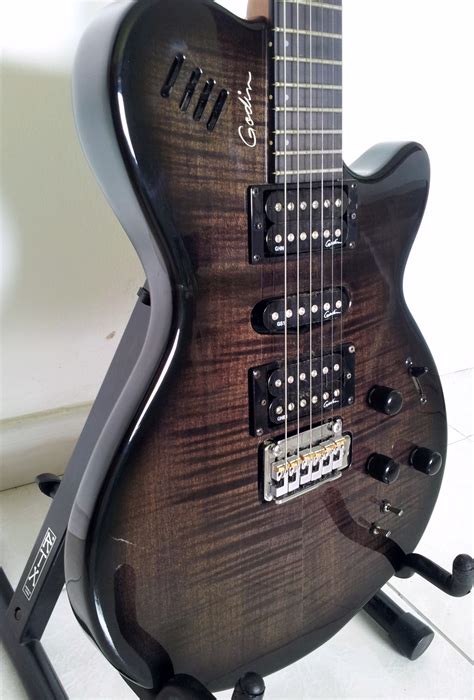 I have been excited to experiment with one for a long time, so i borrowed my friend's multioud. Godin xtSA image (#596827) - Audiofanzine