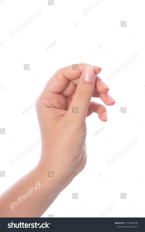Womans Hand Measuring Invisible Items On Stock Photo 1572068938