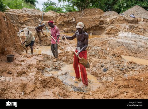 Workers Digging At A Diamond Mine In The Jungle Kenema Eastern