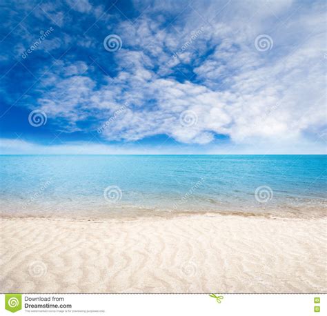 Sandy Beach With Gentle Waves And Sunny Skies Stock Photo Image Of