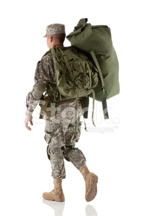 Rear View Of An Army Soldier Walking With Luggage Stock Photo Royalty
