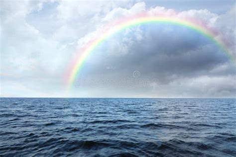 Beautiful View Of Rainbow In Sky Ocean Stock Image Image Of Cool