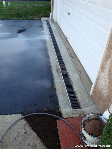 Trench Drain Installation For The Residential Driveway