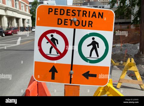 Sign For A Pedestrian Detour On A Street In Calgary Canada The Sign