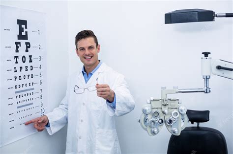Premium Photo Optometrist Pointing At Eye Chart