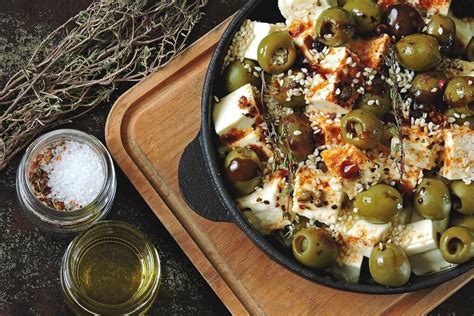 This Baked Olives Recipe With Feta Fresh Herbs Is A Charcuterie Board