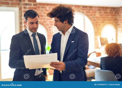 Two Young Handsome Businessmen Working Together Stock Image Image Of