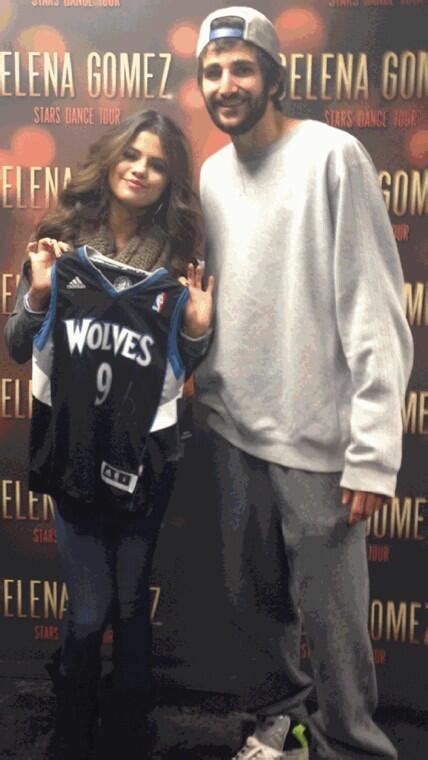 Ricky Rubio Poses With Selena Gomez Photo ~ Holdout Sports