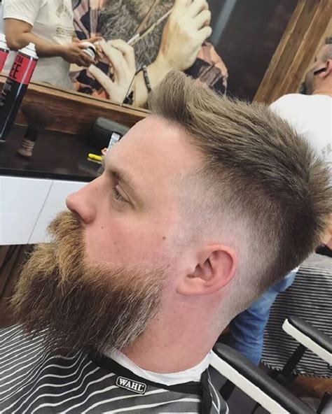 In fact, fade haircuts add a polished quality to otherwise basic beard styles. Full Beard With High Skin Fade | Fade haircut with beard ...