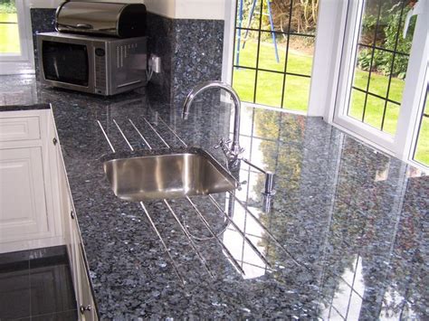 This create a classic look that will remain stylish for many years. Image result for blue pearl granite countertop | Blue ...