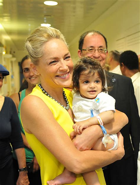 'he thought i would look better'. Sharon Stone visits pediatric wards in Israel