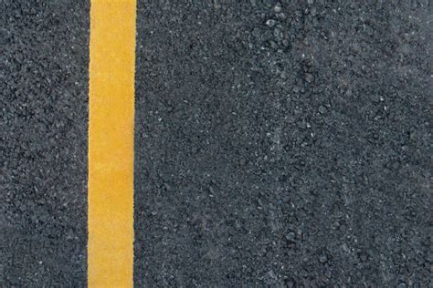 Yellow Road Paint Stock Photos Pictures And Royalty Free Images Istock