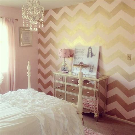 Before applying your glitter wall paint, you will want to take the time to clean your entire wall first. A blush pink and gold Chevron Allover stenciled accent wall in a girl's room by Maria. http ...